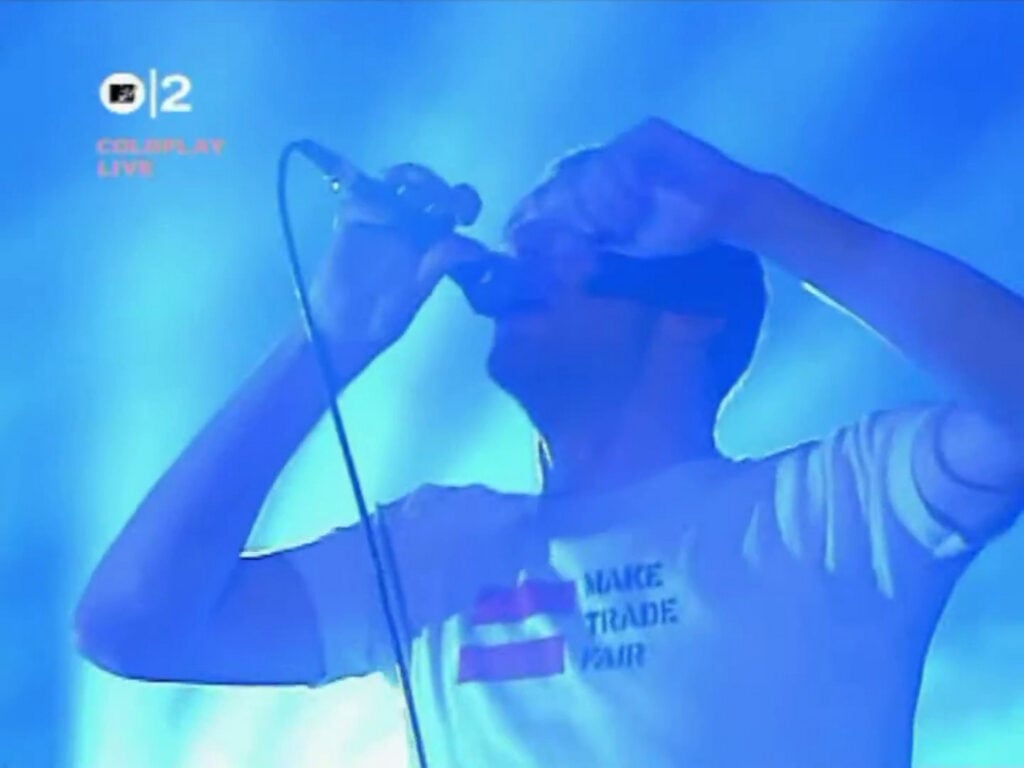Coldplay | Chris Martin Stage-Worn, Customized & Band-Signed "Make Trade Fair" T-Shirt (2002-2004)